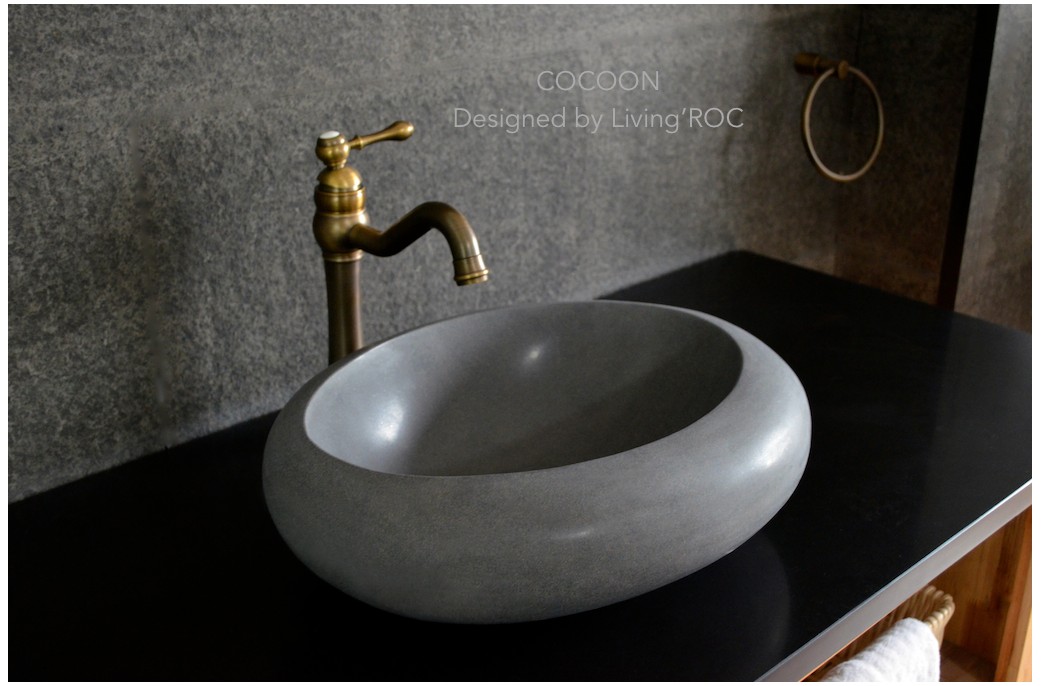 A gray vessel sink for a bathroom in need of calming, neutral tones