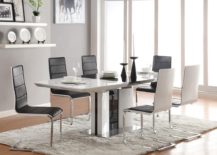 A-simple-white-rug-as-the-key-element-in-a-modern-dining-room-217x155