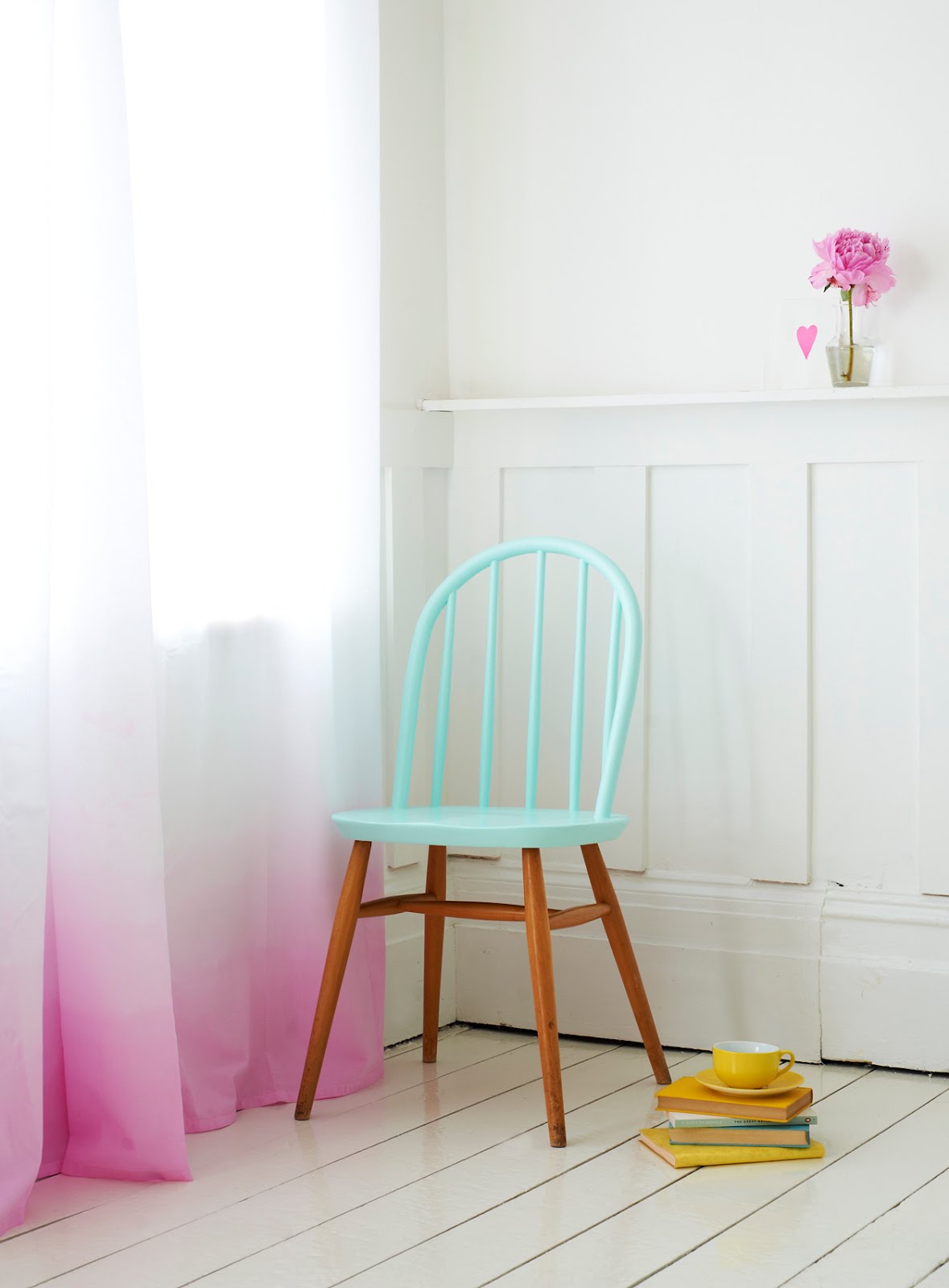 A soft tone of ombre pink at the bottom of the curtains