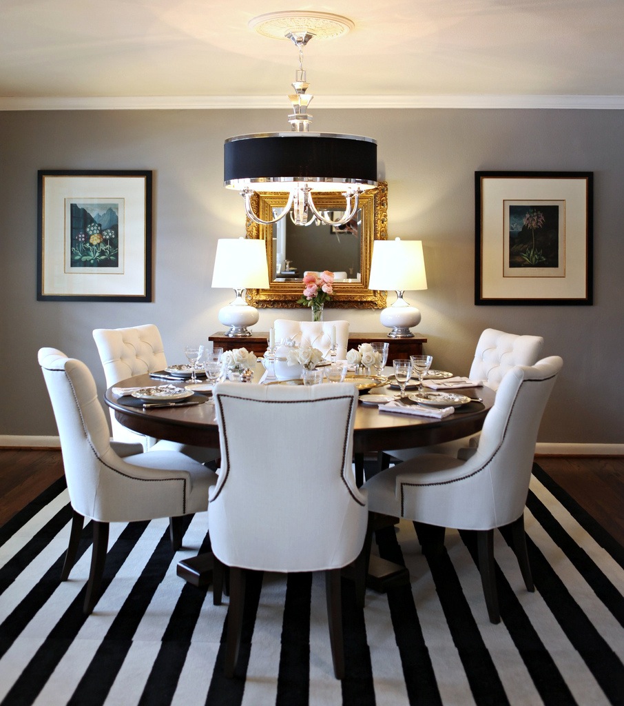 A striped rug brings elegance and dynamic into the dining room