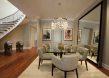 A-vast-beige-rug-as-a-cohesive-element-in-an-elegant-dining-room-217x155