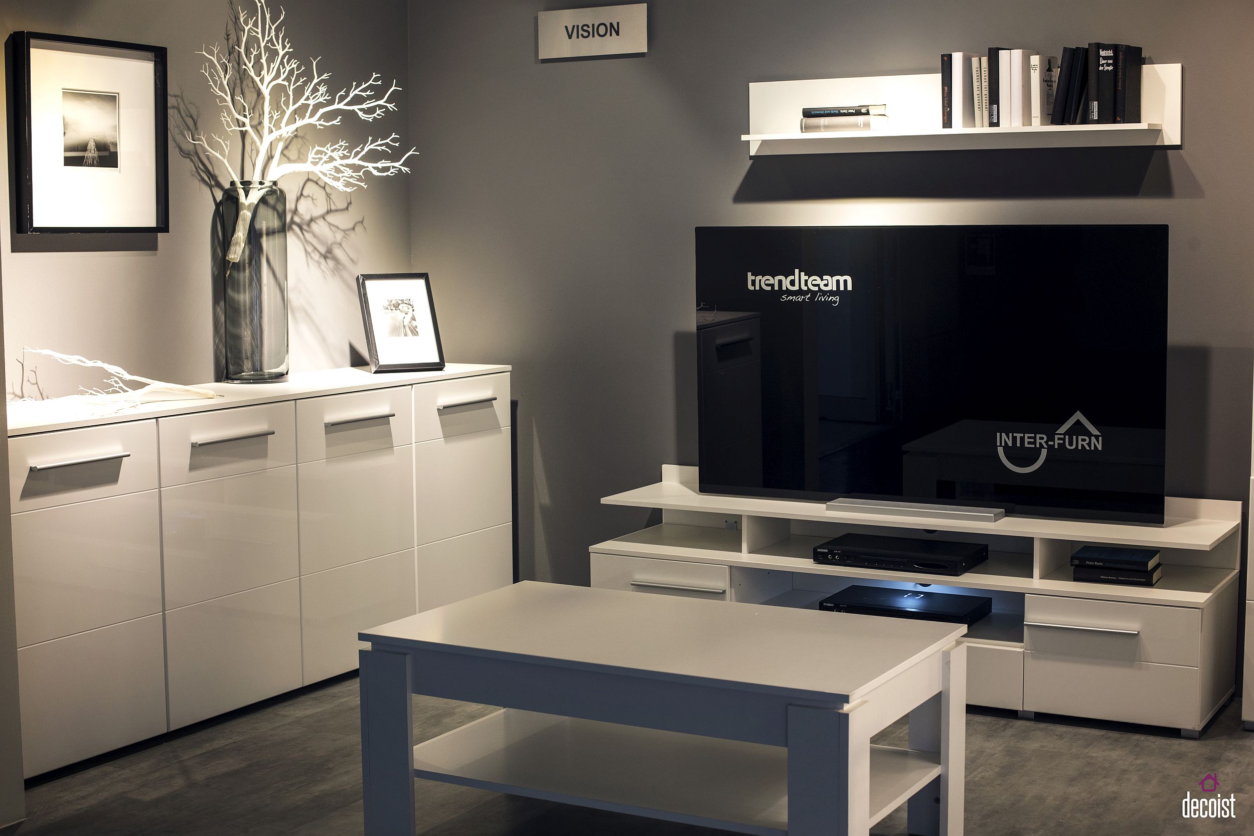 All-white TV unit with matching floating shelves is perfect for the smart contemporary living room