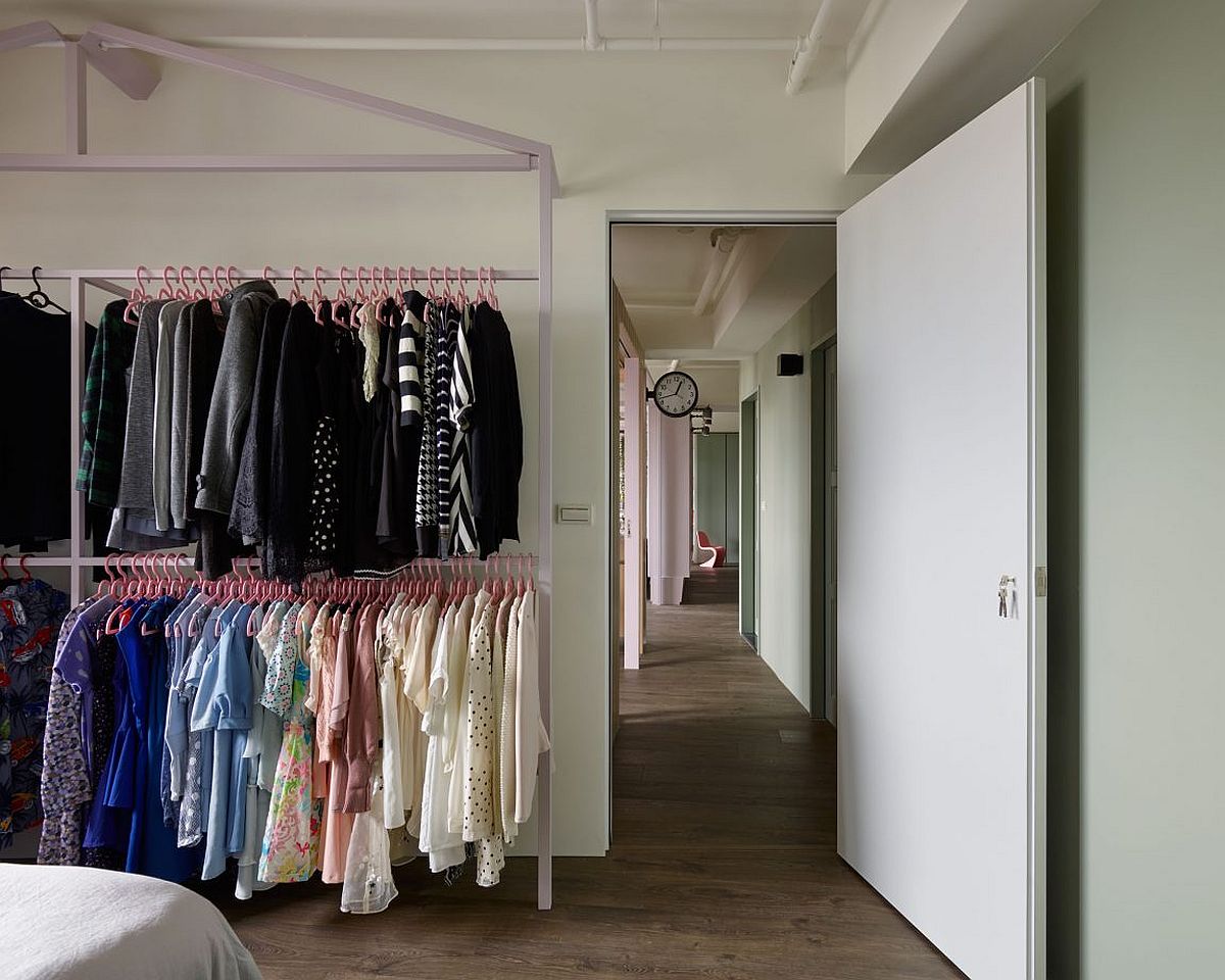 Ample space for clothes with standalone shelves in the bedroom