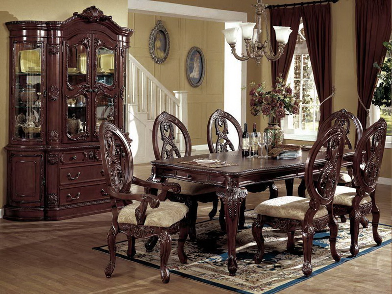 Antique dining room with a rug that is proudly showcasing some color