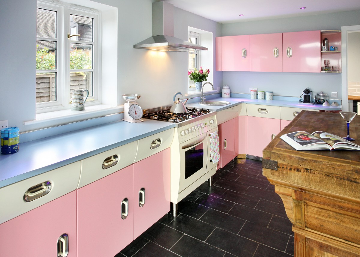 Balanced blue and pink kitchen with a 1950s vibe