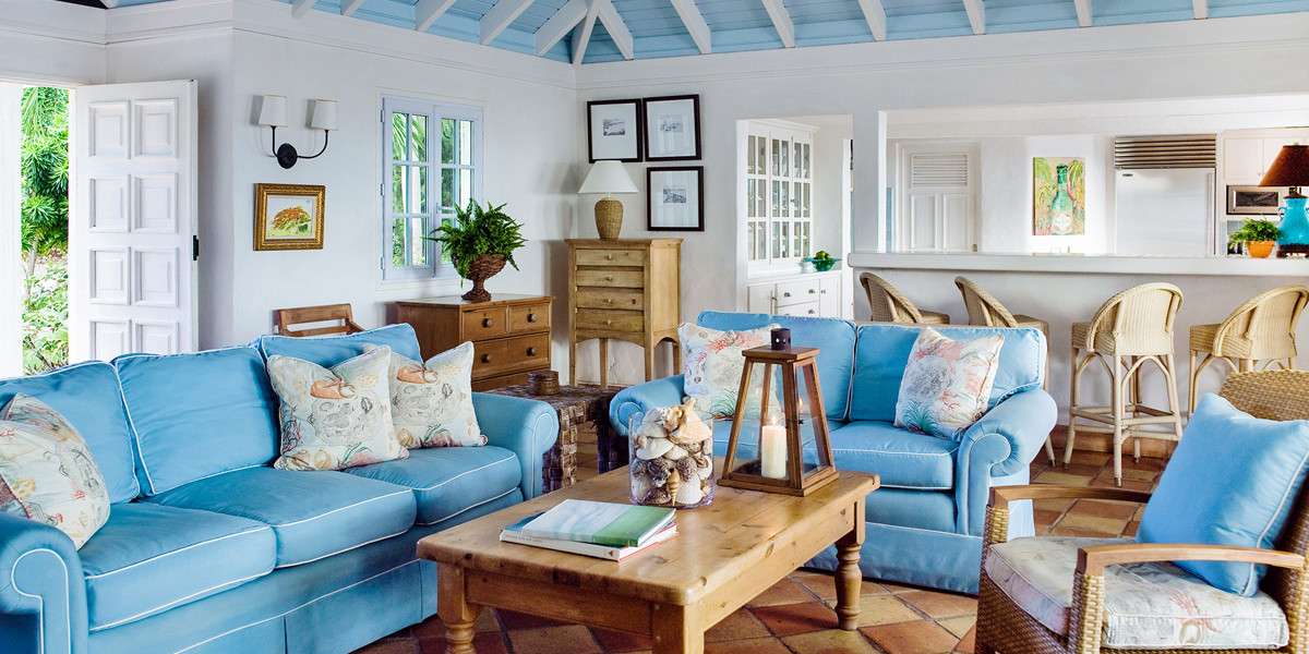 Balanced interior created by bold blue and rustic wooden furniture