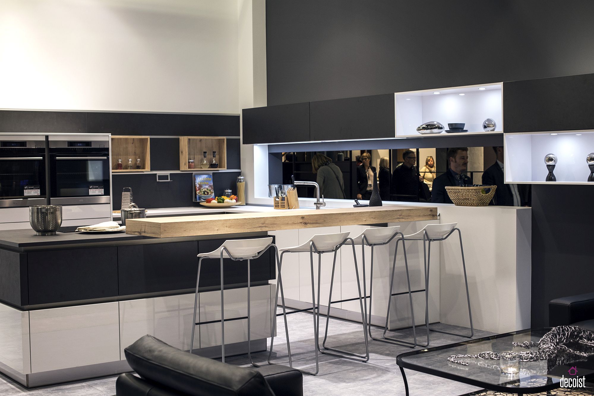 Balanced use of gray and white in the modern kitchen with wooden breakfast bar