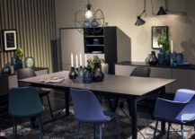 Beautiful-vases-in-the-backdrop-accentuate-the-visual-ipact-of-blue-chairs-in-this-black-and-white-dining-room-217x155