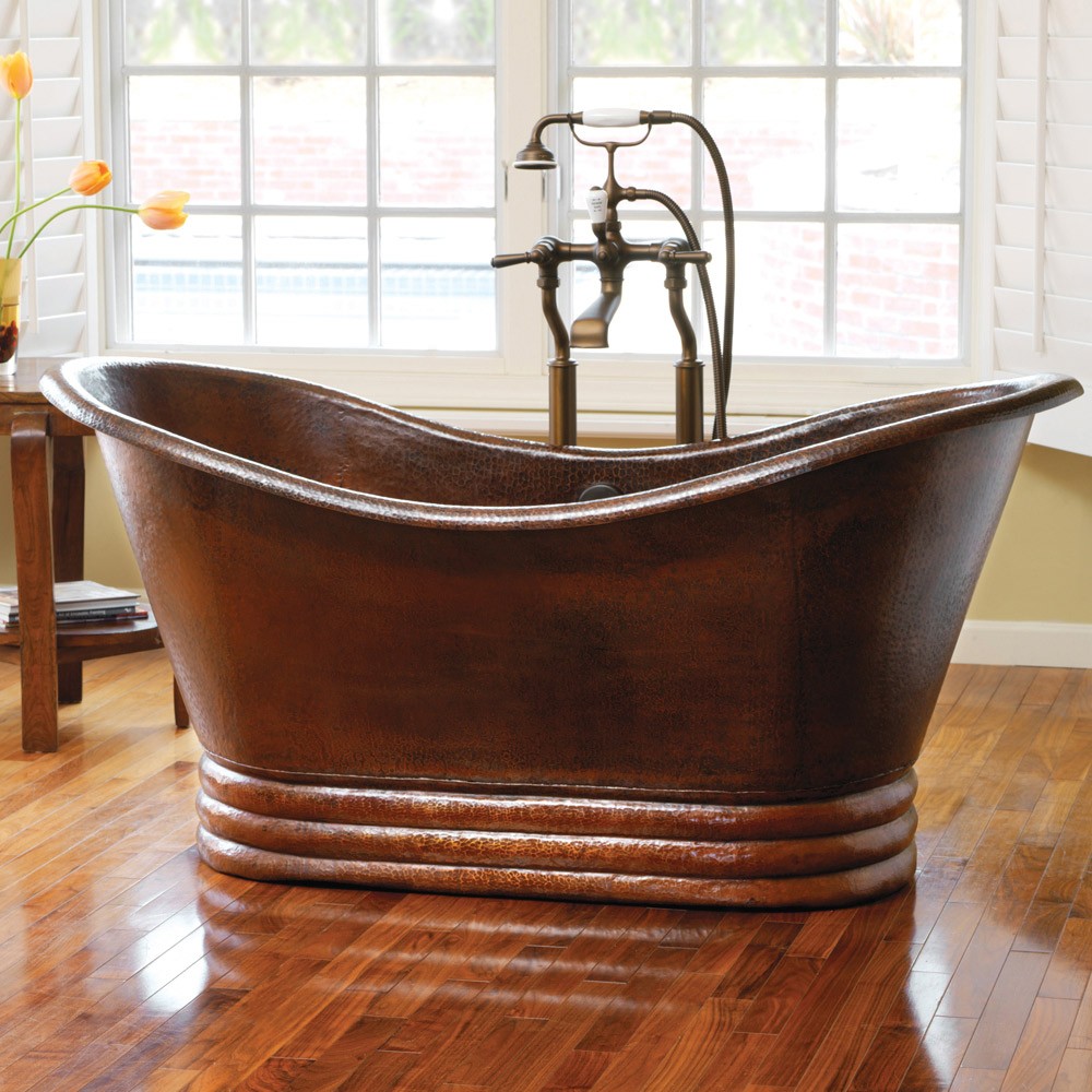 Bright-bathroom-with-a-copper-bathtub-in-the-center-
