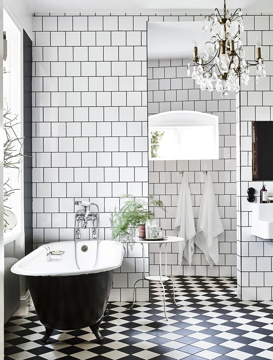 Bright bathroom with diagonal checkerboard floors