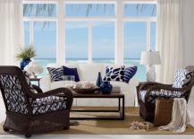 Coastal-living-room-with-dark-woven-chairs-and-navy-blue-cushions--217x155