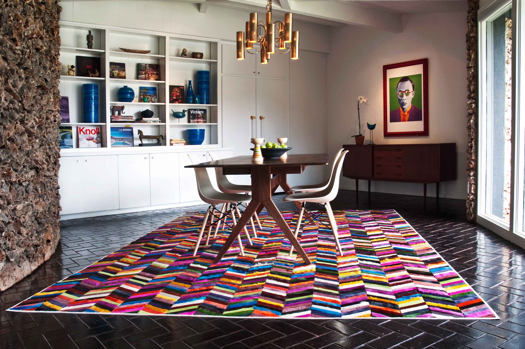 Contemporary dining room with a rug that is vibrant and alive