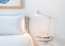 Contemporary-side-table-in-white-from-West-Elm-along-with-a-cool-table-lamp-217x155