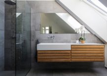 Contemporay-bathroom-with-angular-ceiling-and-ample-natural-light-217x155