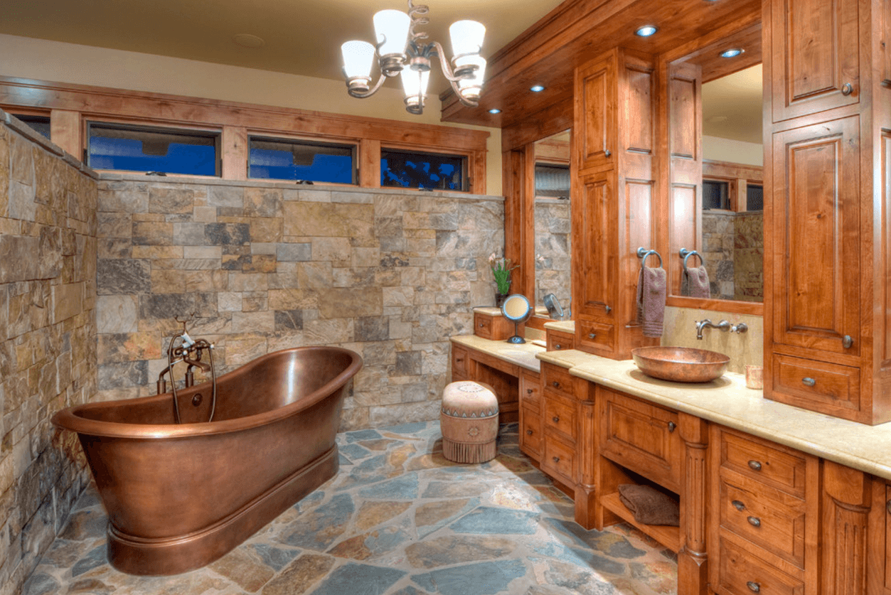 Copper bathtub in a cohesive, natural bathroom