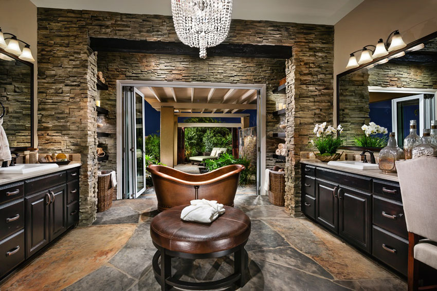 Copper bathtub is a great contrast to the dark wood interior