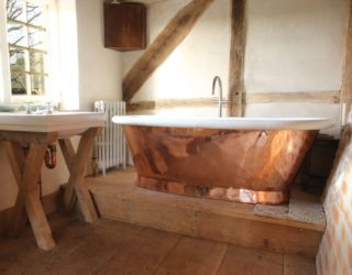 16 Copper Bathtubs That Completely Reinvent The Space