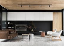 Dark-wall-in-the-backdrop-adds-to-the-sophisticated-appeal-of-the-interior-217x155