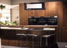Elevated-design-of-the-breakfast-bar-top-frees-up-the-island-countertop-as-a-prep-zone-217x155