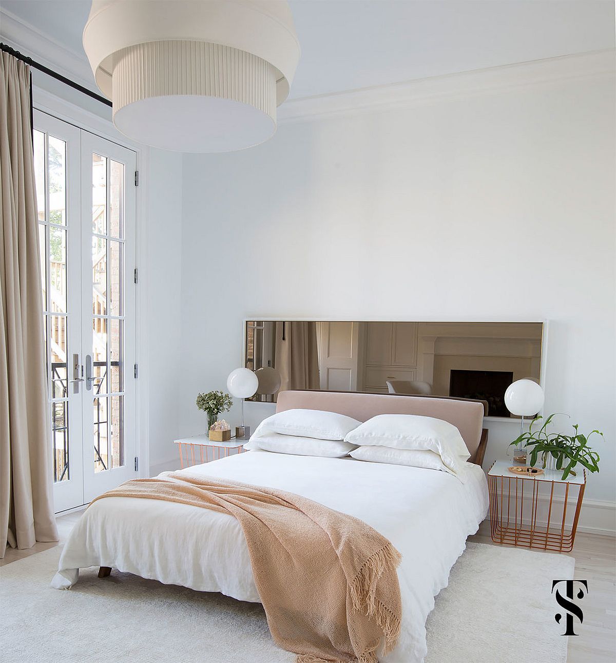 Feminine-bedroom-in-white-and-light-brown-with-matching-bedside-tables