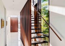 Glass-window-next-to-the-staircase-brings-the-bamboo-garden-indoors-217x155