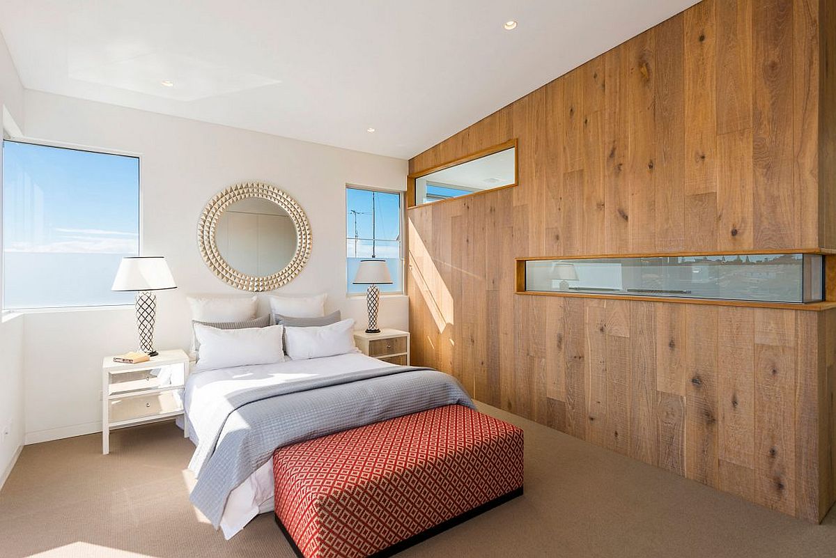 Gorgeous-wooden-accent-wall-with-cutouts-for-the-bedroom-in-white-with-beach-view