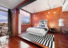 Industrial-bedroom-with-brick-walls-and-ample-lighting-217x155