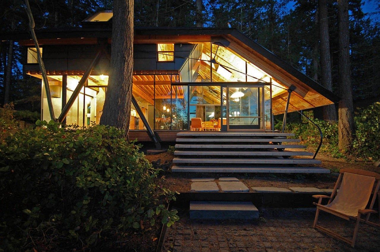 Insulated framed canopy and glass walls create a warm and charming cabin in Wahsington
