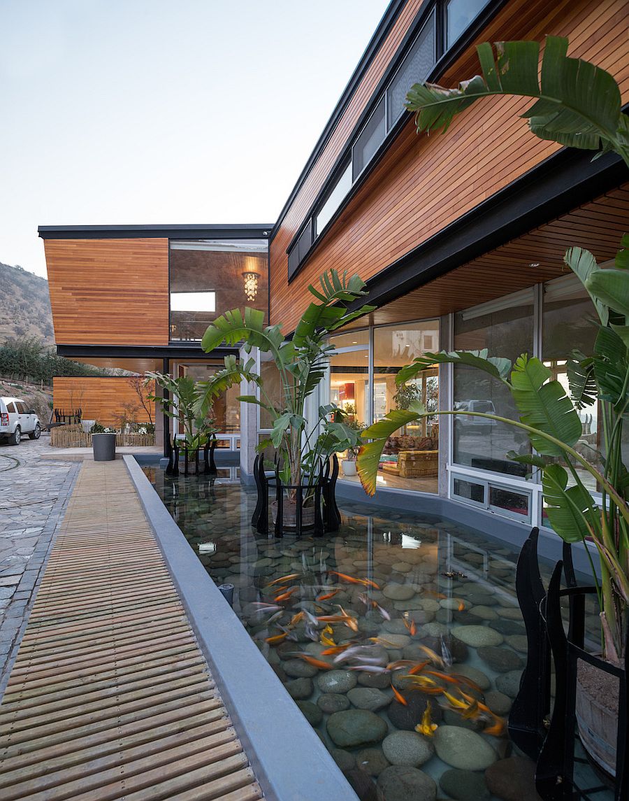 Koi pond along with an infinity pool and reflecting pond bring tranquility