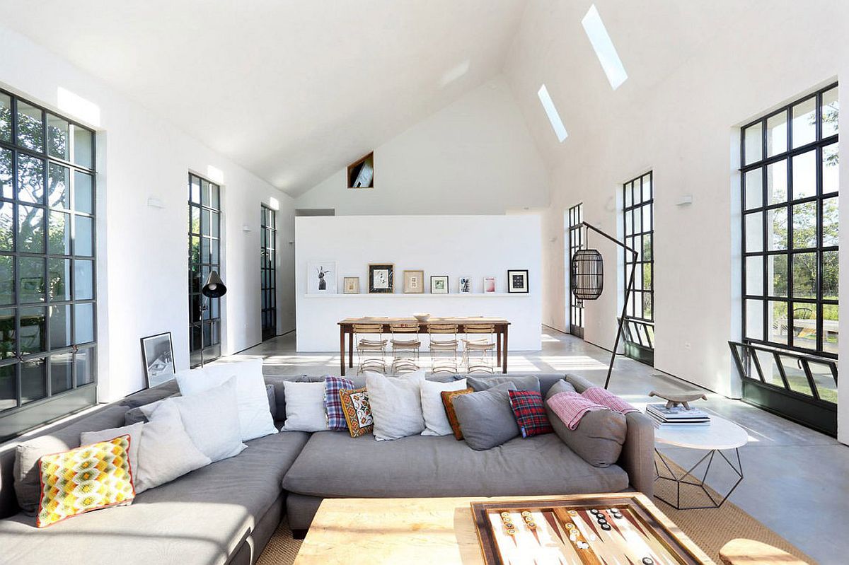 Living-and-dining-room-in-white-with-slanted-ceiling