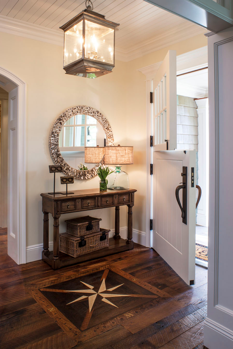 Maximize on space and place the decor elements behind the front door
