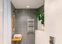 Modern-bathroom-in-white-with-floor-and-walls-covered-in-tiles-217x155