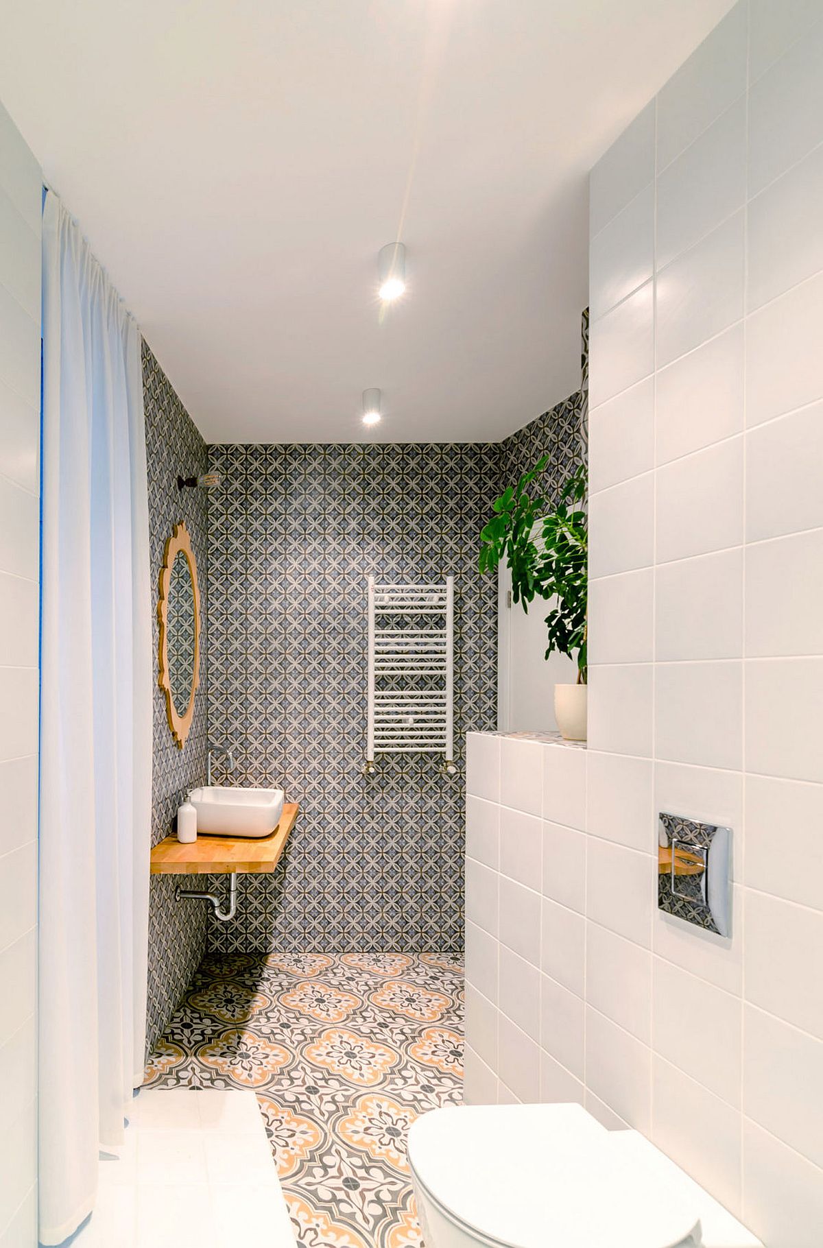 Modern bathroom in white with floor and walls covered in tiles