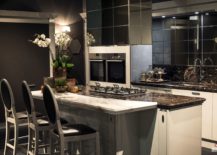 Modern-classic-kitchen-from-Scavolini-in-black-and-white-with-an-island-that-multi-tasks-217x155