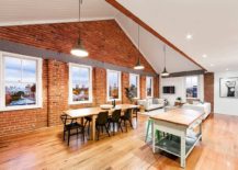 Old-brick-along-with-beam-and-truss-ceiling-give-the-apartment-industrial-charm-217x155