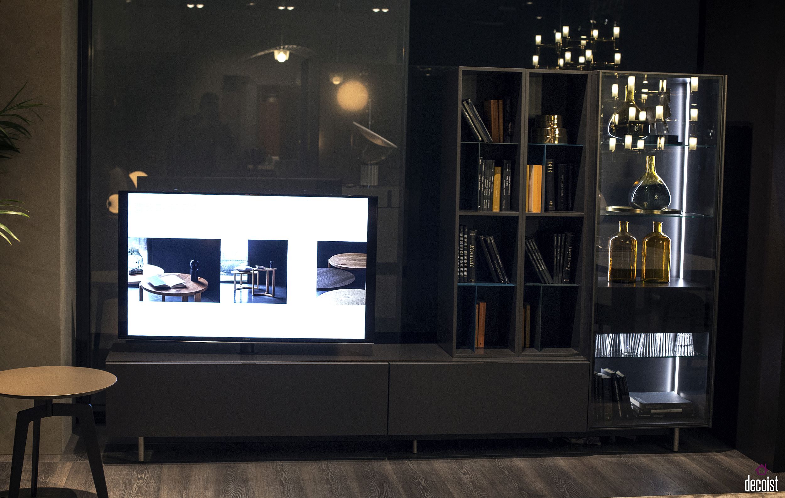 Open shelves with glass doors and LED lighting coupled with the gorgeous TV stand