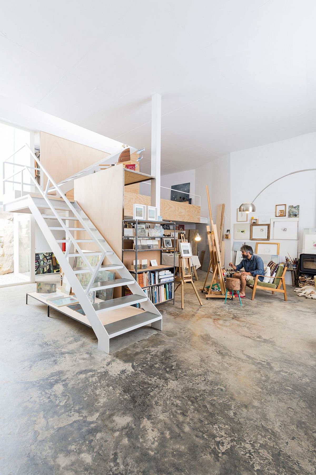 Painting studio with ample natural lighting and spacious appeal