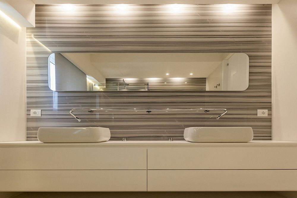 Polished-tiling-for-the-bathroom-backsplash-creates-a-stylish-contemporary-look