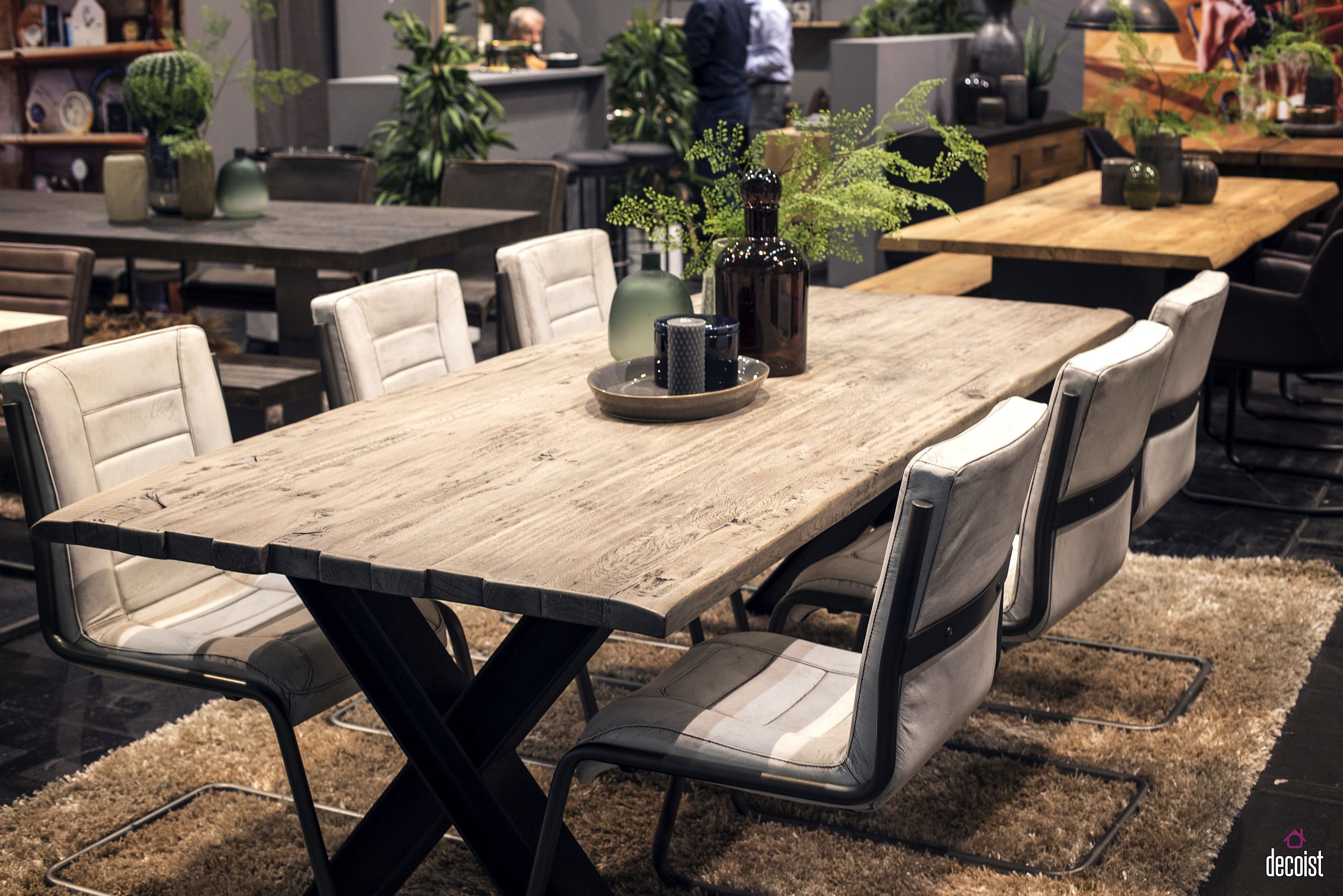 Rustic dining table coupled with contemporary chairs in the dining room