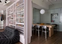 Shelving-with-glass-doors-in-the-living-room-and-dining-space-brings-exclusivity-to-the-Taiwan-apartment-217x155