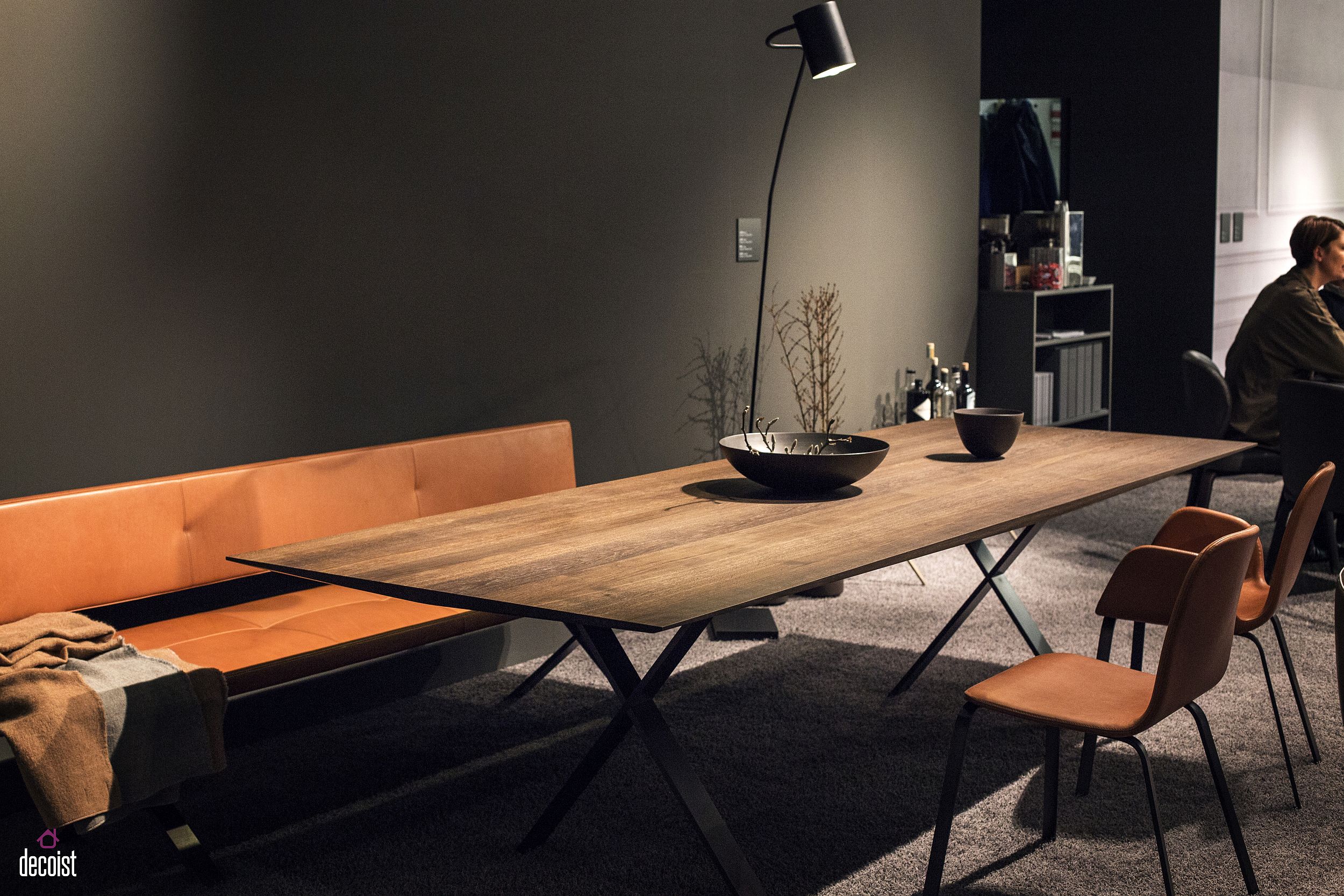 Sleek, dining table, modern cushioned bench and leather chairs for the chic dining room