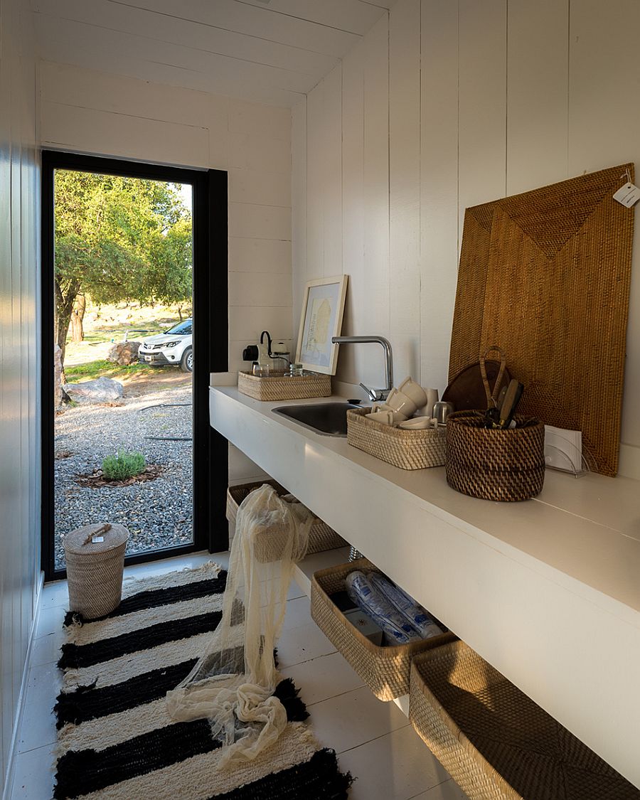 Small kitchen with sink and storage space