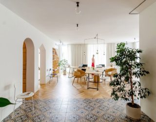 Ingenious Plywood Partitions and Drapes Turn Apartment into Workspace