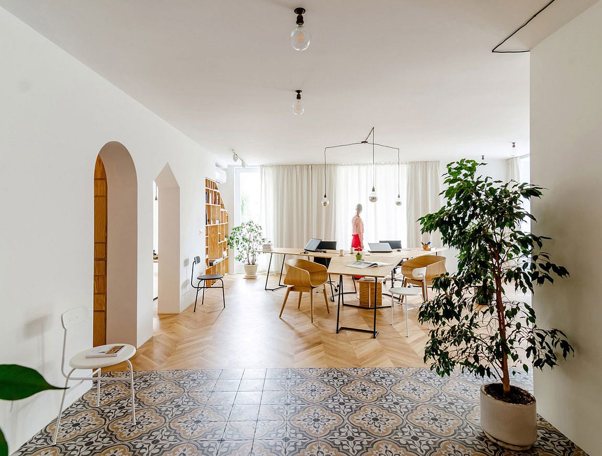 Tiles-drapes-and-plywood-shelves-delineate-space-in-this-open-studio