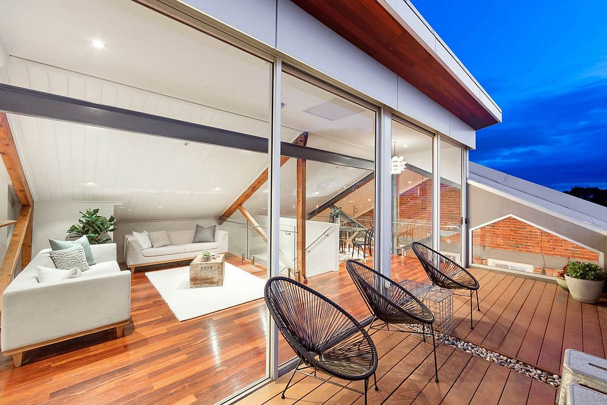 Upper-level-sitting-area-connecetd-with-the-balcony-that-offers-a-view-of-Melbourne