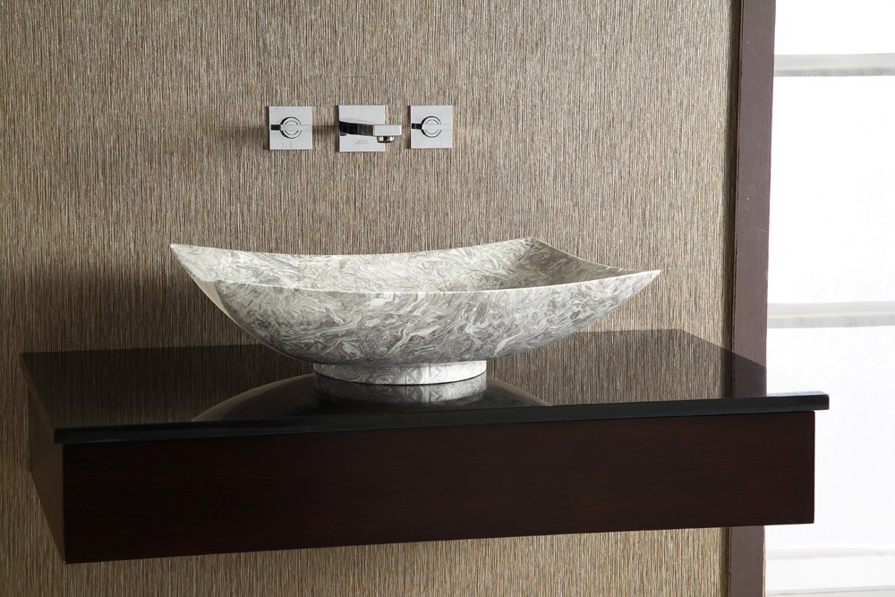 Vessel sink in combination with wall mounted faucets