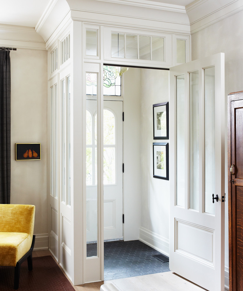 White walls and subtle decor in a plain entryway