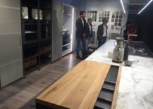 Wooden-prop-zone-for-the-kitchen-island-in-marble-217x155