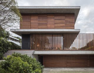 Bravos House: Encased in Moving Wooden Panels and Slats