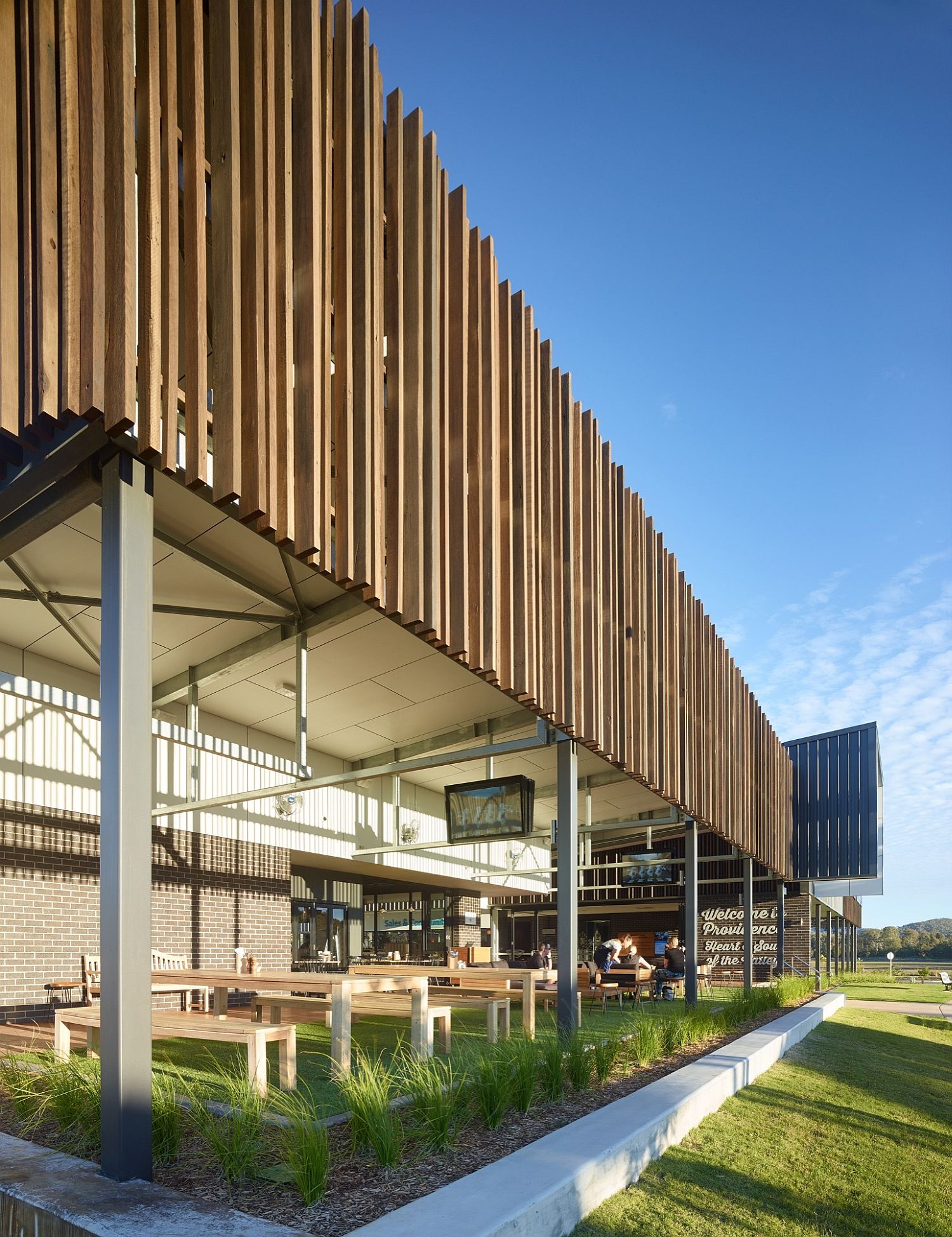 Wooden slats give the facade of the building a unique look